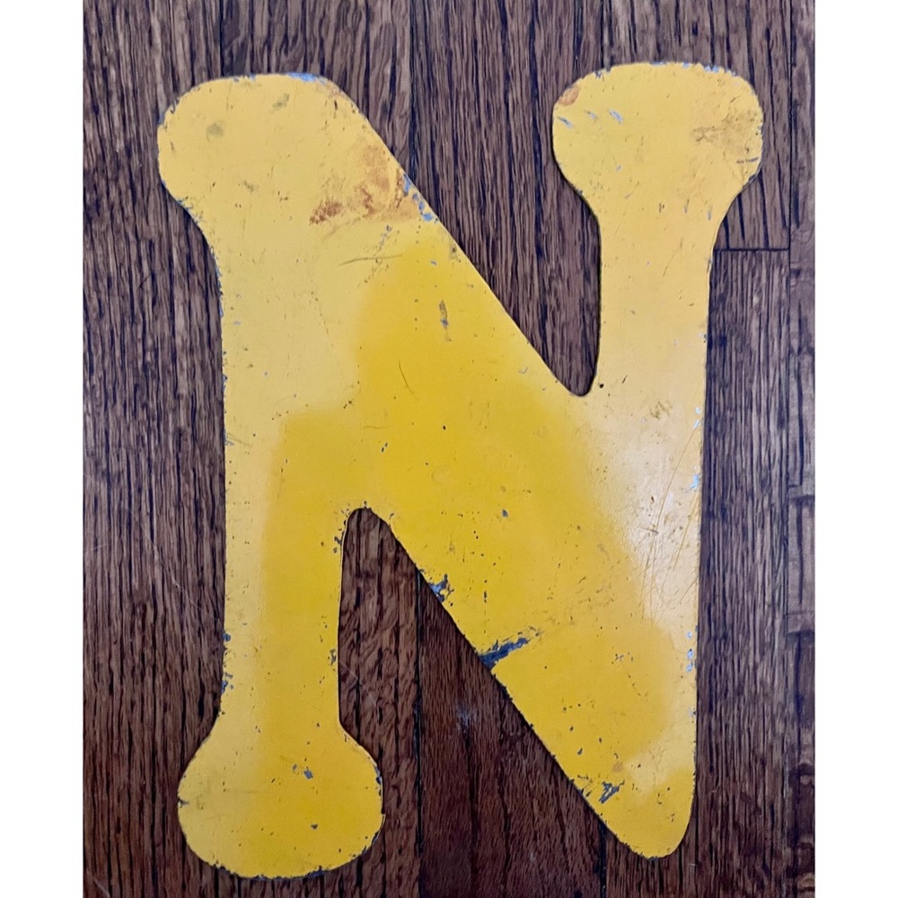 Vintage Metal Letter N in Mustard Yellow.